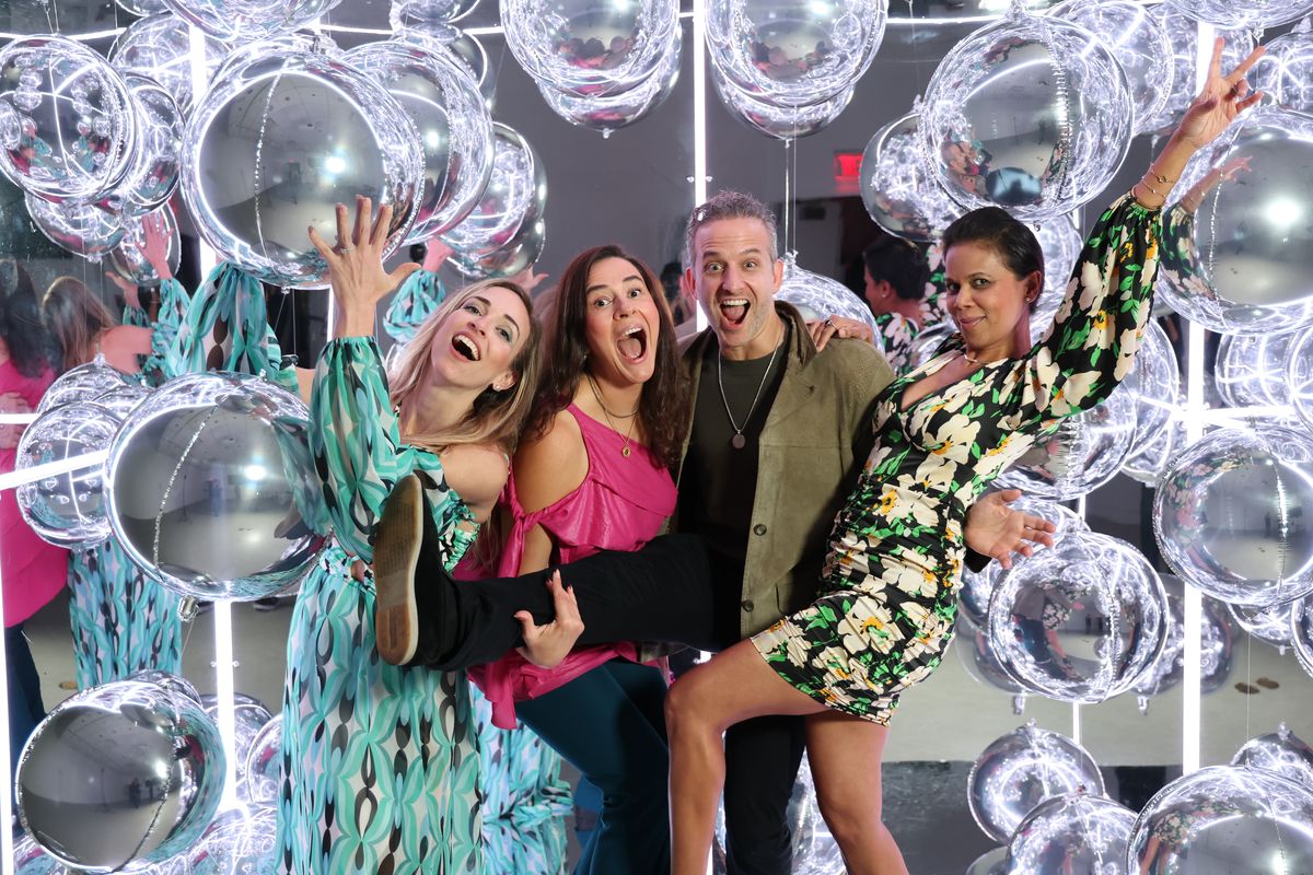 Party group photo with silver balloons