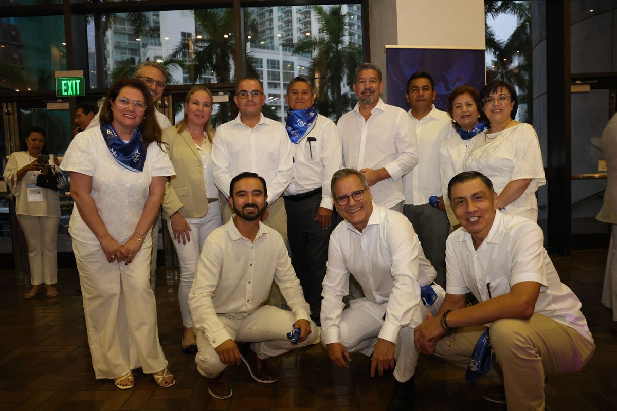 Team group photo at a Miami event